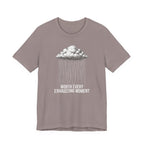 T-shirt with cloud and raindrop design on a white background